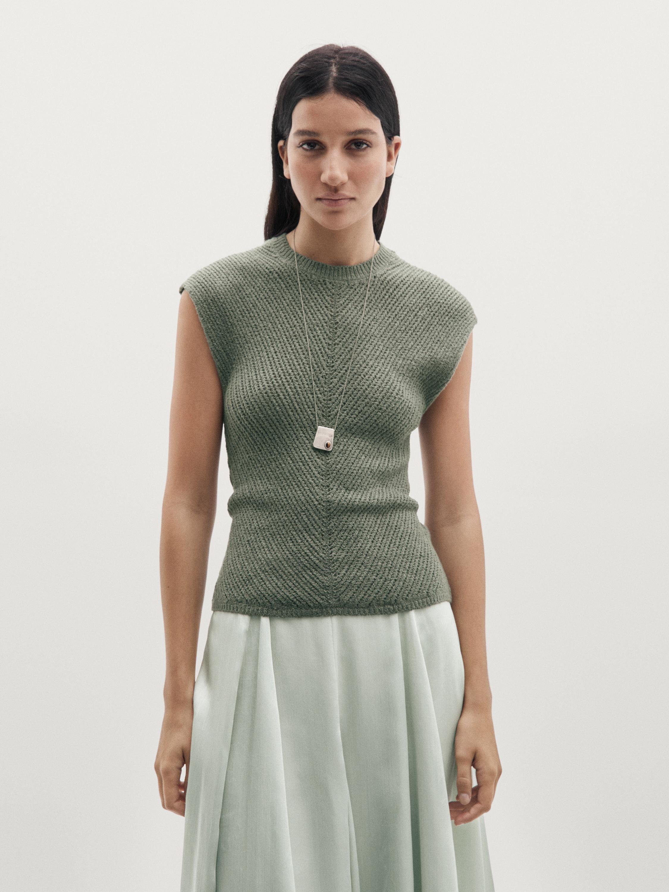 Top en maille sans manches à ajours fantaisie